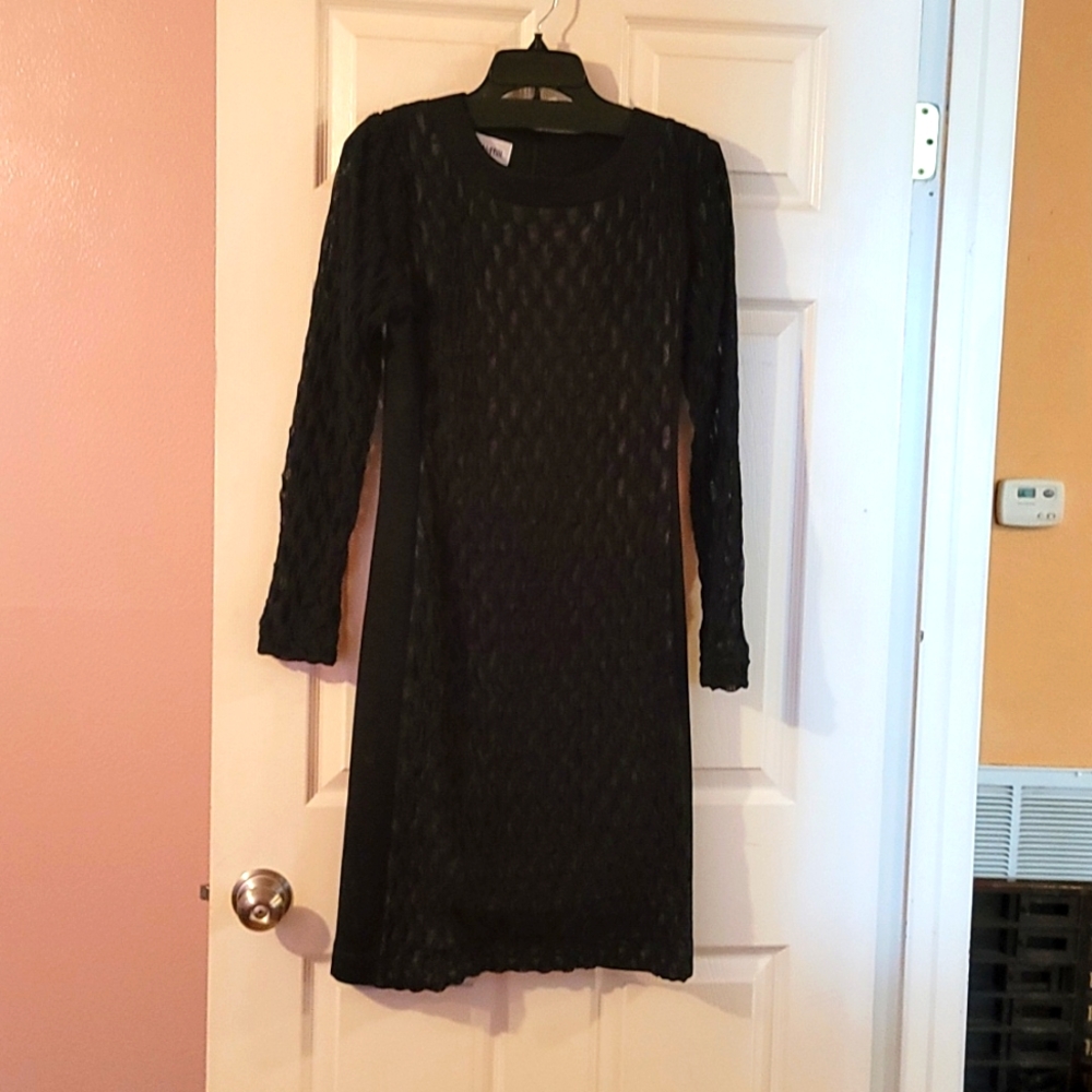 Sara Cambell Black over nude lace dress.